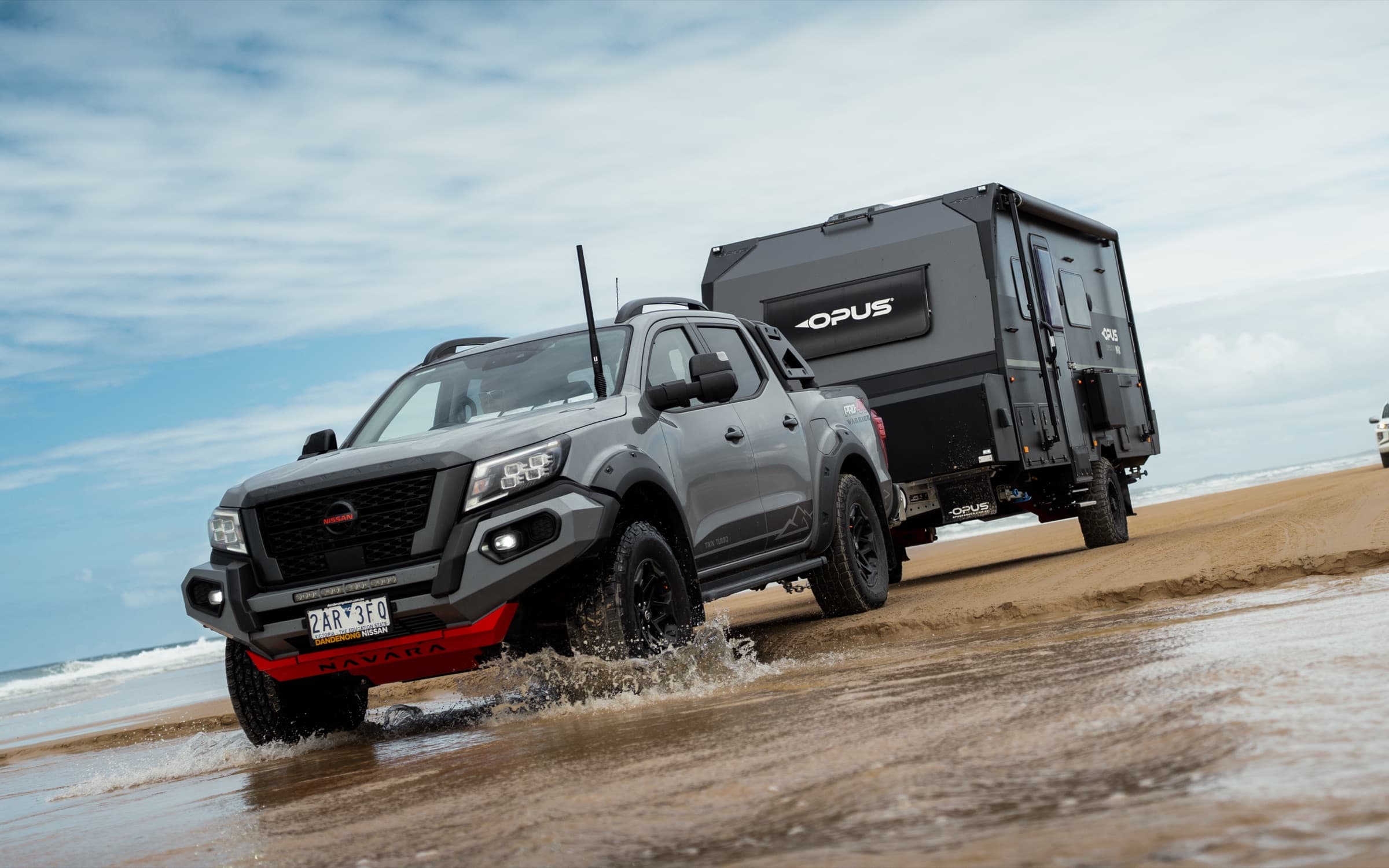 OPUS hybrid splashing through a beach washout