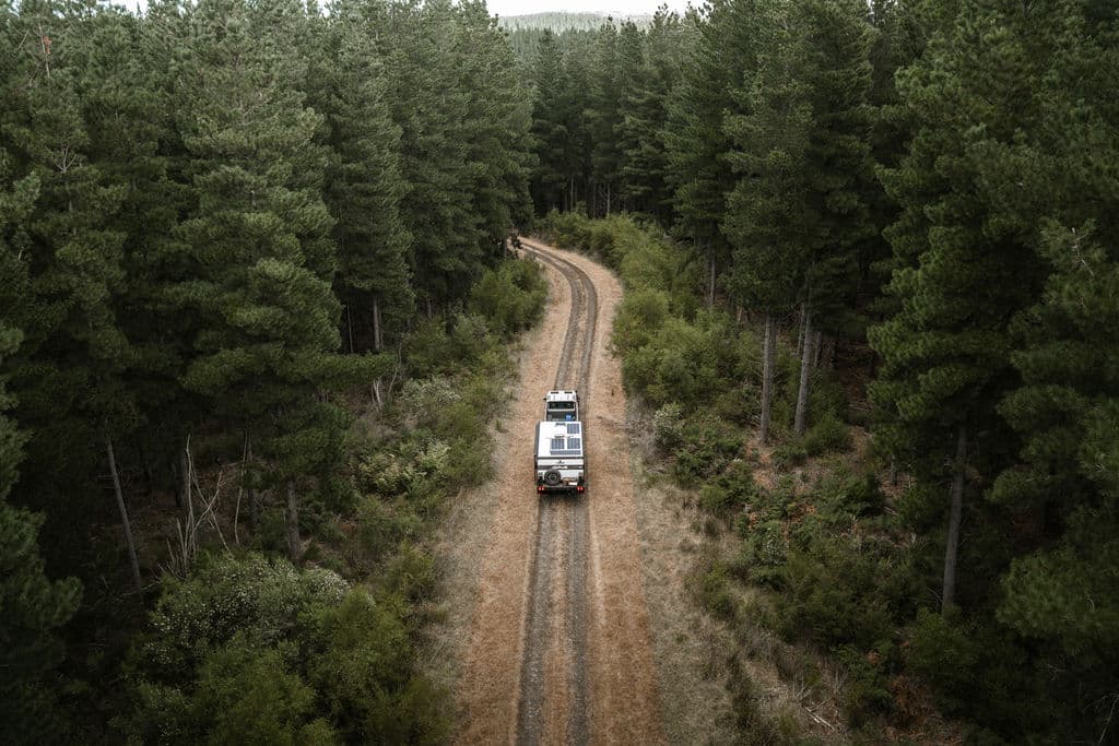 OPUS Expedition Max towed down a remote forest track